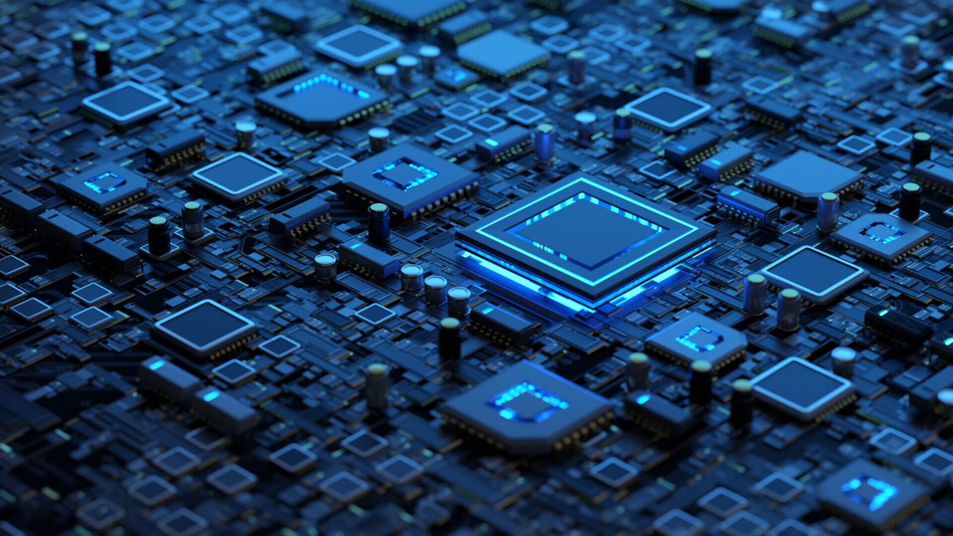 Close-up of a blue circuit board with a central microchip.